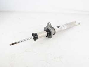 Genuine Left Front Spring Strut*Scratch And Dent*