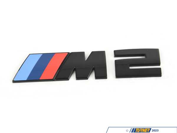 Genuine BMW Genuine BMW G87 M2 Trunk Emblem - Black  51145A76513