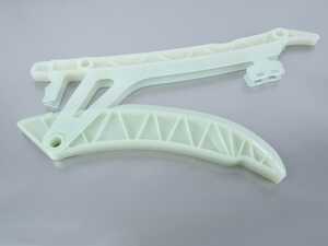 Lower Timing Chain Tensioner With Guide Rail